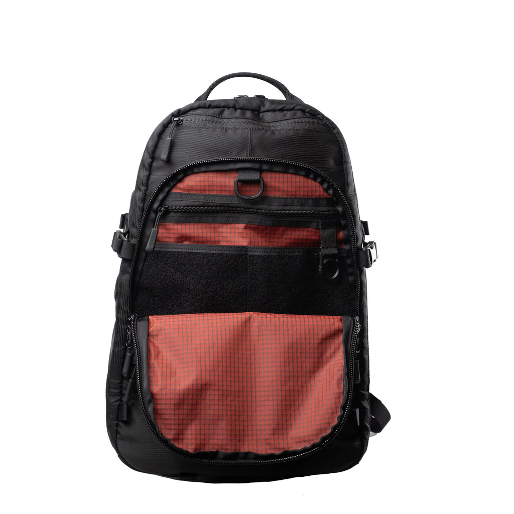 Alpha One Niner EVADE 1.5 Gen 2 25L backpack, front pocket open showing organiser and loop panel