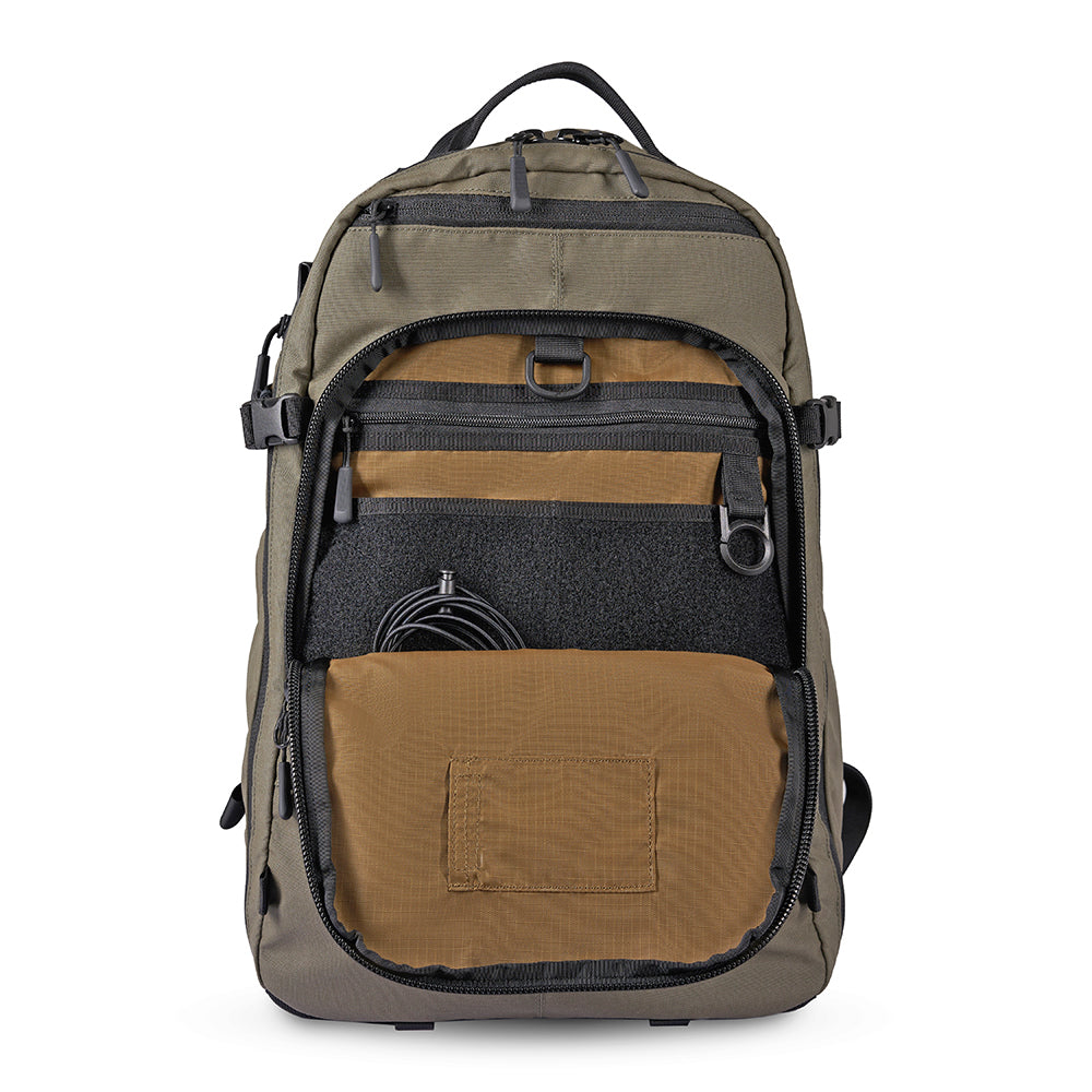 Alpha One Niner EVADE 1.5 Gen 2 25L backpack in Ranger Green, front pocket open showing tan organiser