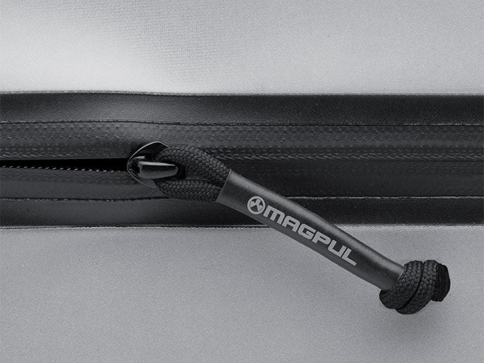 Closeup of Magpul DAKA Large Volume Pouch’s zipper and heat shrink covered zipper pull